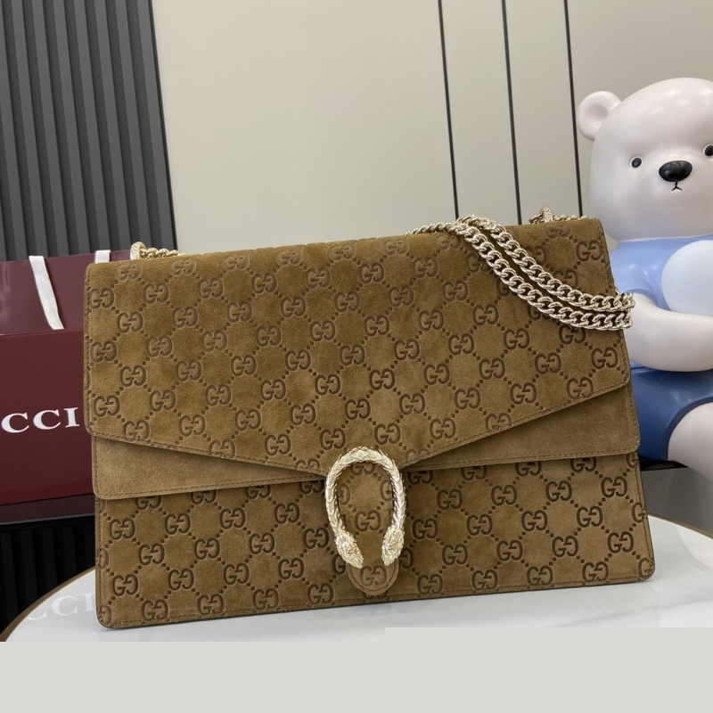 G*u*i clutch bags